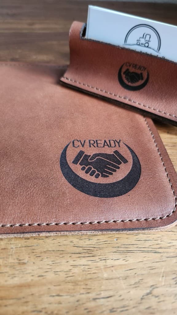 Branded leather desk mat and card holder with custom logo by Plaasjaap